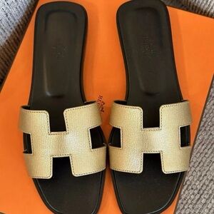 Hermes Gold Slide Sandals
